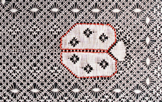 Dentelle torchon, tout savoir sur la dentelle aux fuseaux